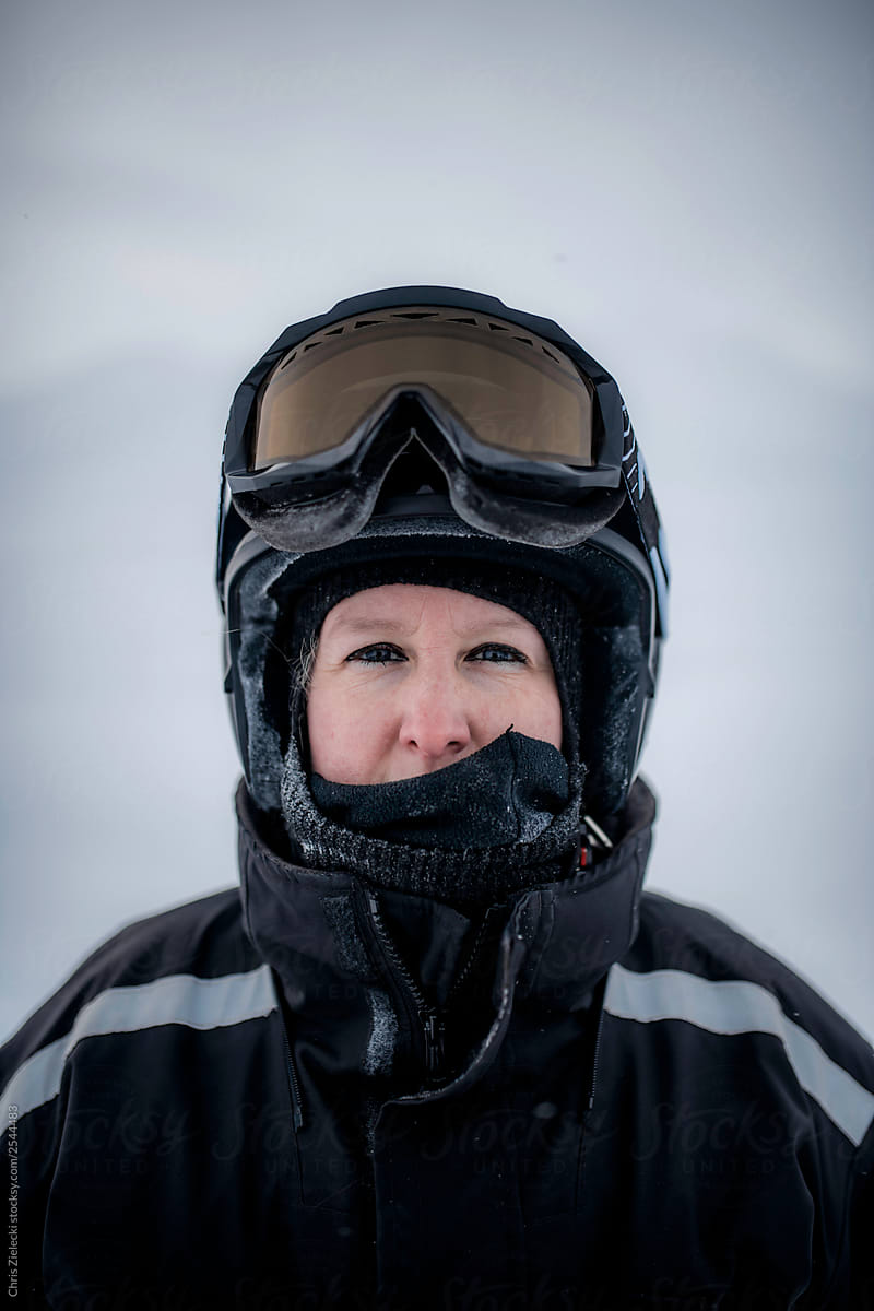 Female traveler looking at camera in arctic nature