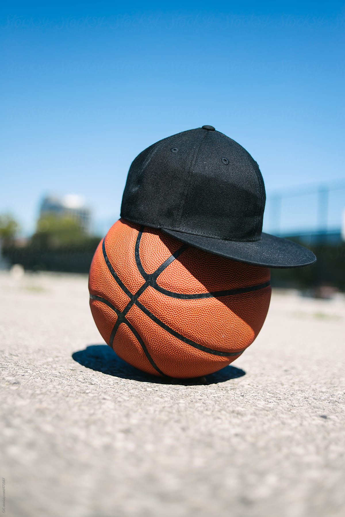Basket ball with a cap