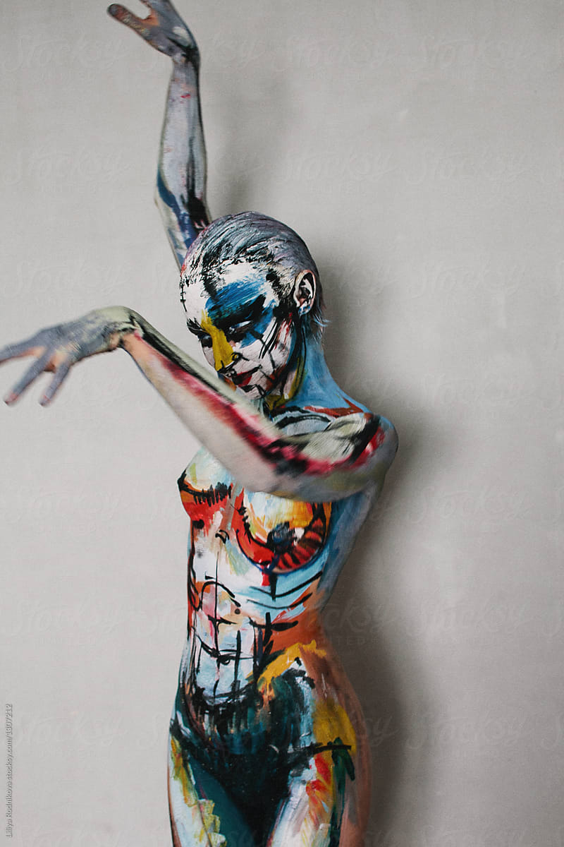 Dancing woman with body art
