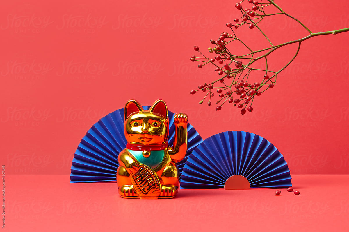 Chinese waving cat and origami fans