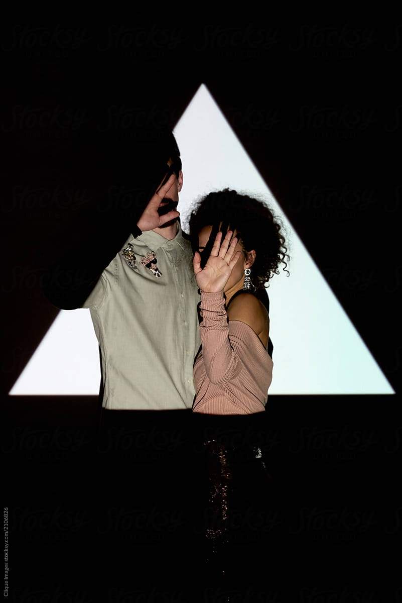 Couple Hiding From Projector Light