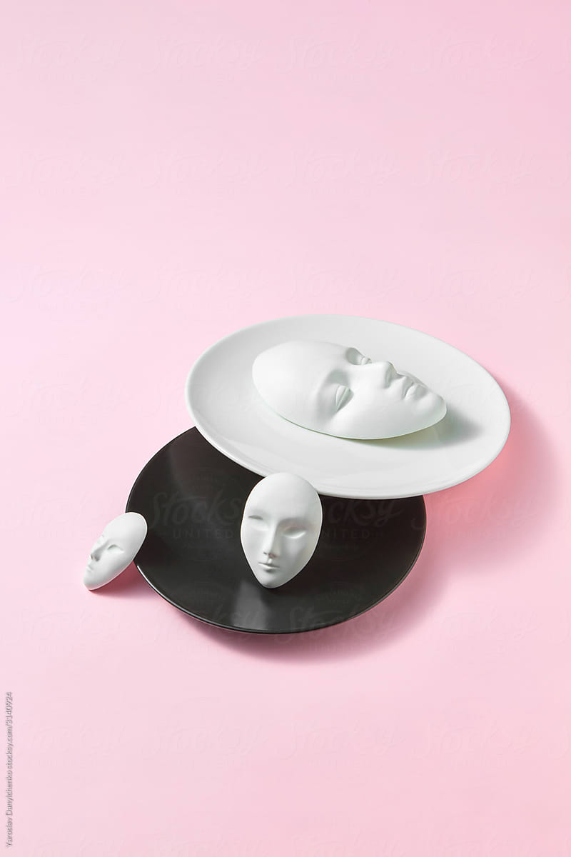 Ceramic plates with plaster masks.