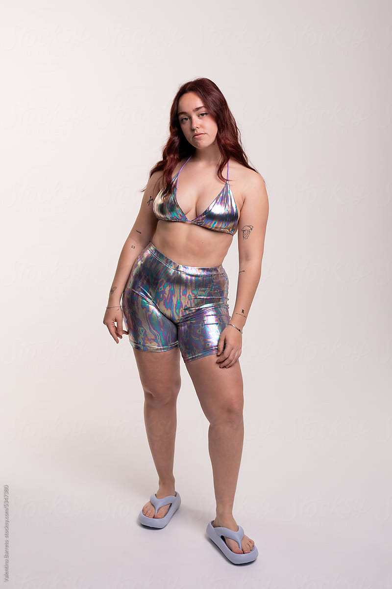 Woman with summery holographic outfit