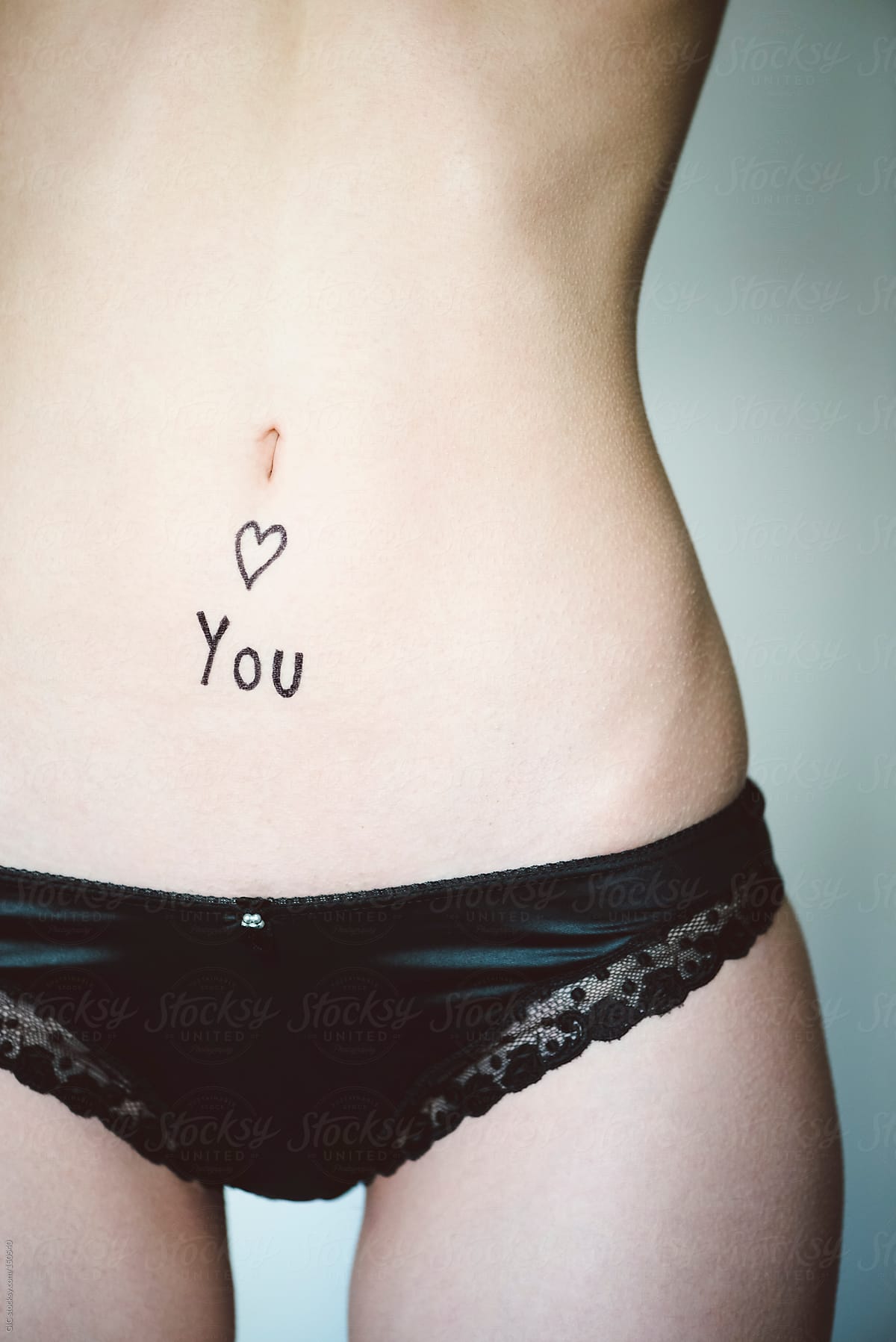 I love you text on woman belly