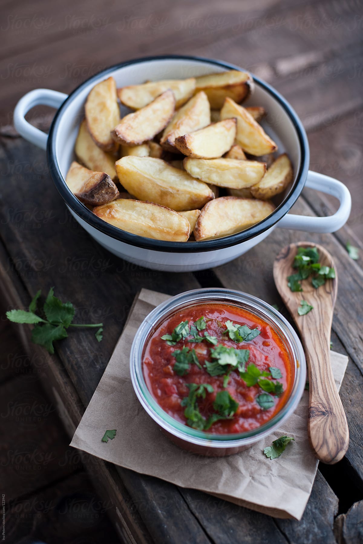 Food: Patatas Bravas, baked potatoes with a spicy tomato sauce g