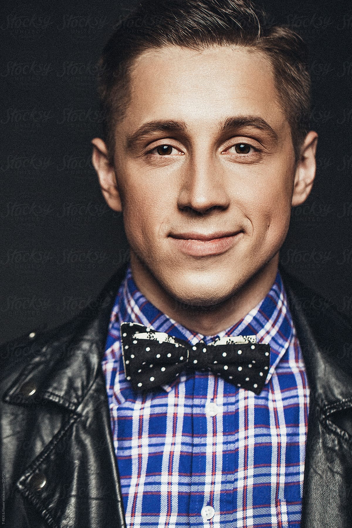 Portrait of handsome young man in bow-tie