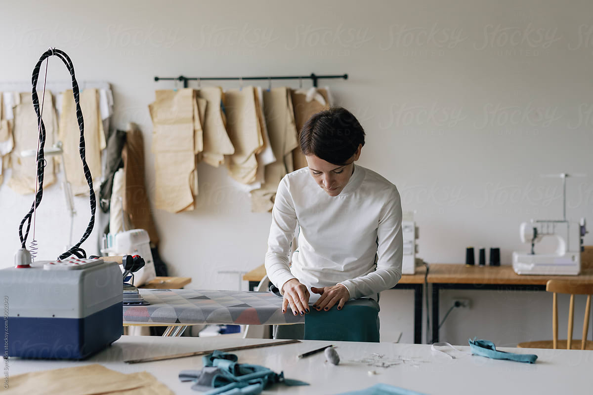 Crafting apparel. Modiste. Fashion studio. Ironing board. Manufacture