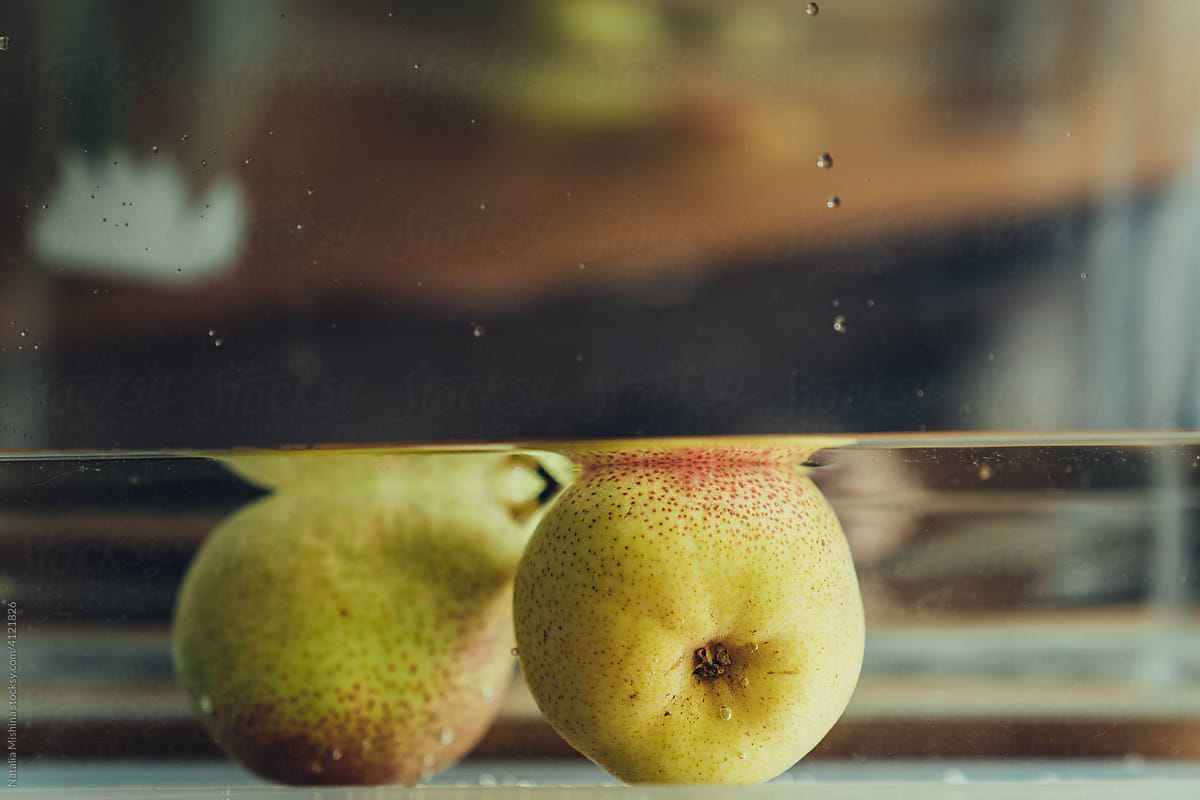 Juicy pear in the water.