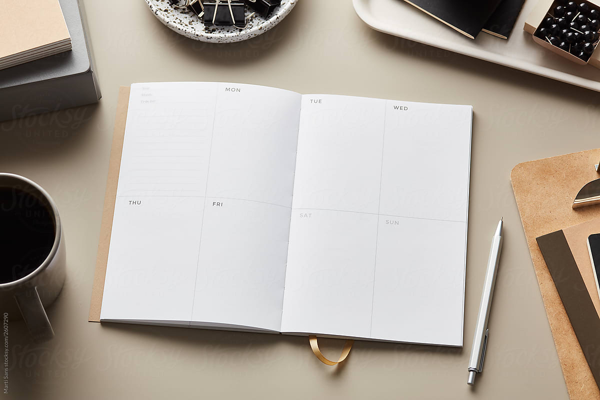 Layout of office supplies with clean notepad