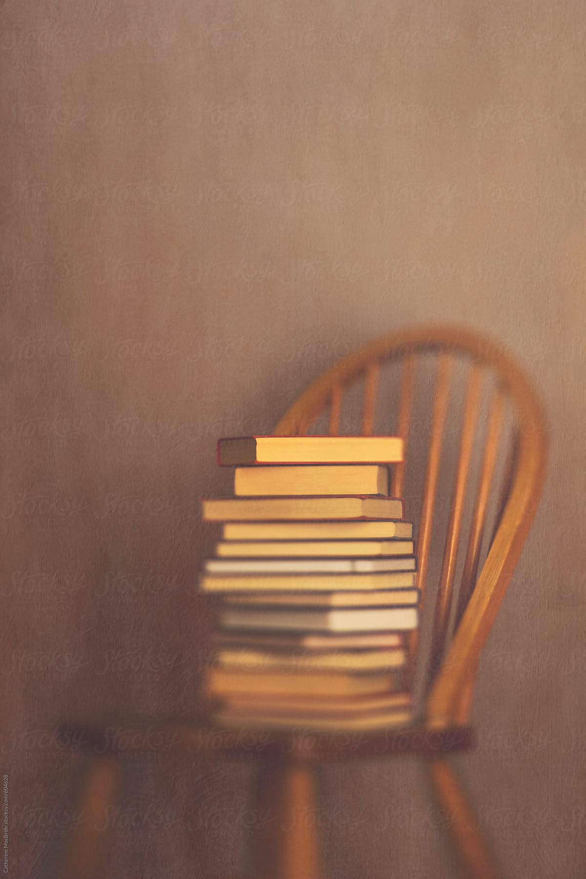 Wooden chair and books...