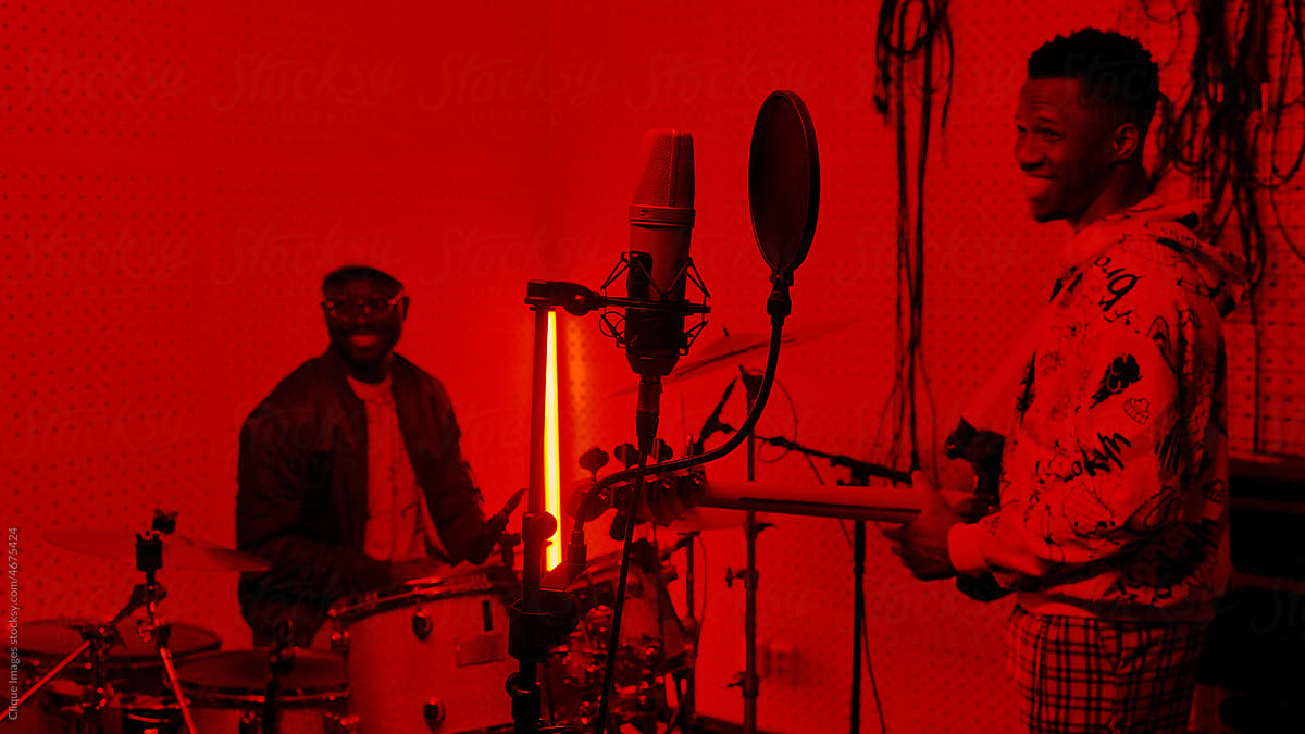 Musicians In Modern Recording Studio