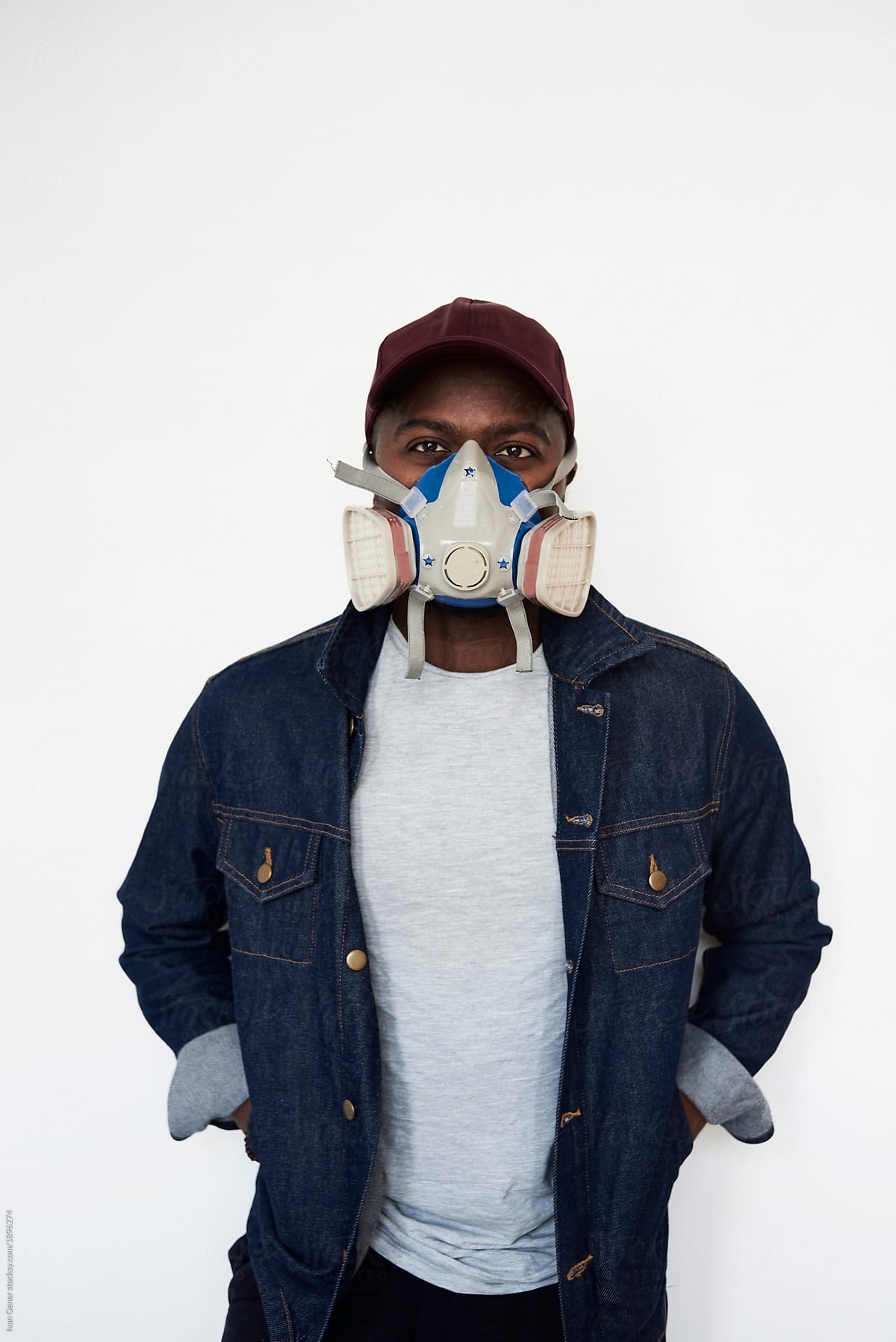 Black male wearing a gas mask