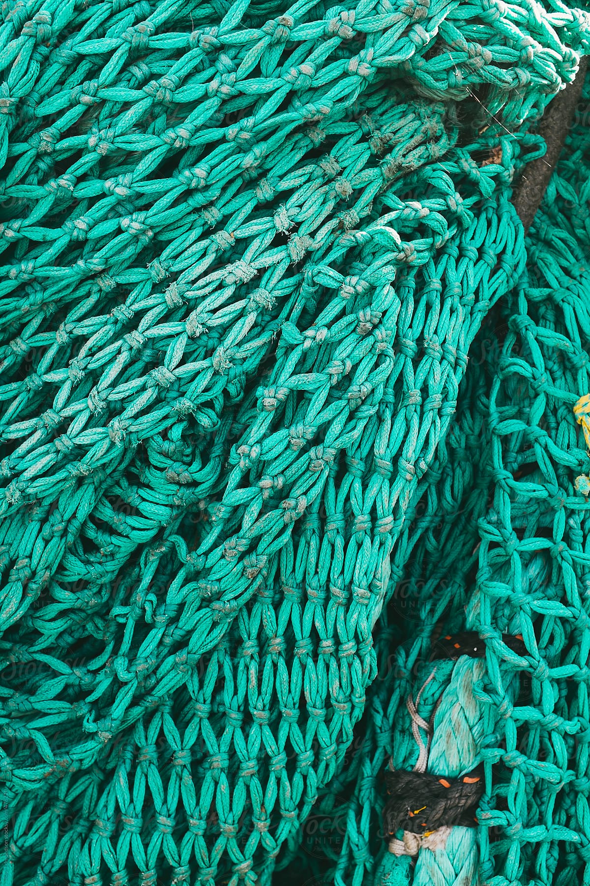 Pile Of Commercial Fishing Nets by Stocksy Contributor Rialto Images -  Stocksy