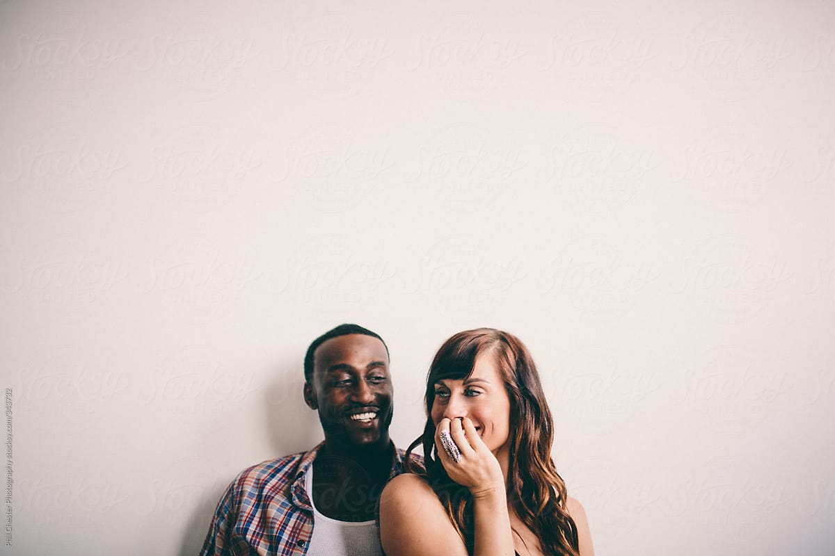 Interracial Couple Laughing Together By Phil Chester Photography