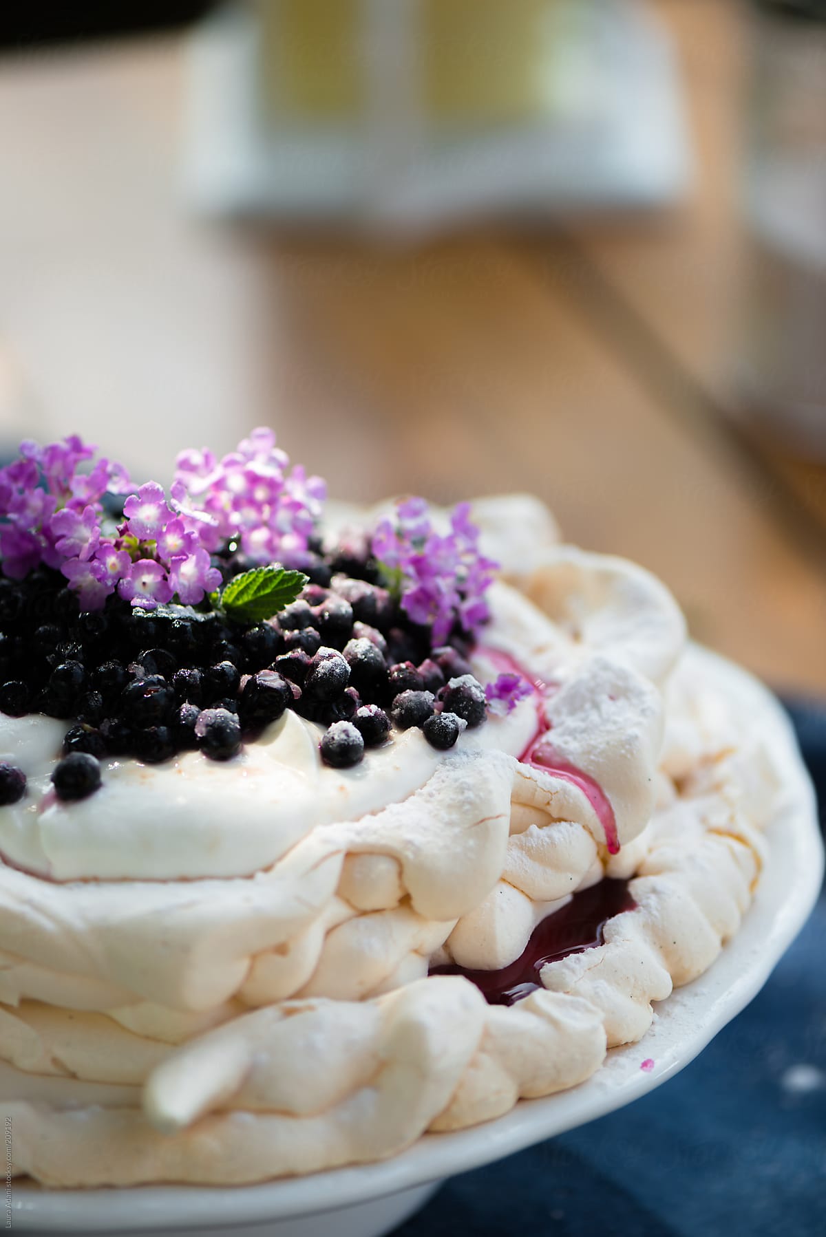 pavlova with blueberries and whipped cream