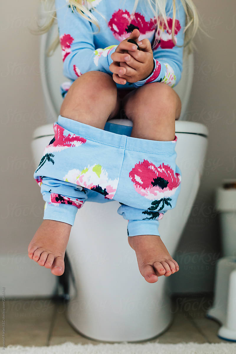 Child Seated on Toilet potty training