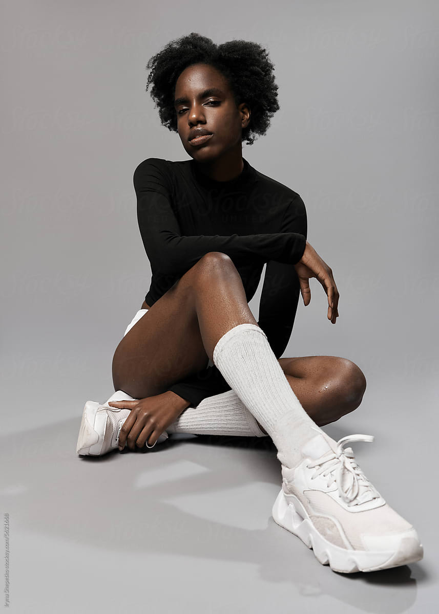 Young black model posing in photo studio