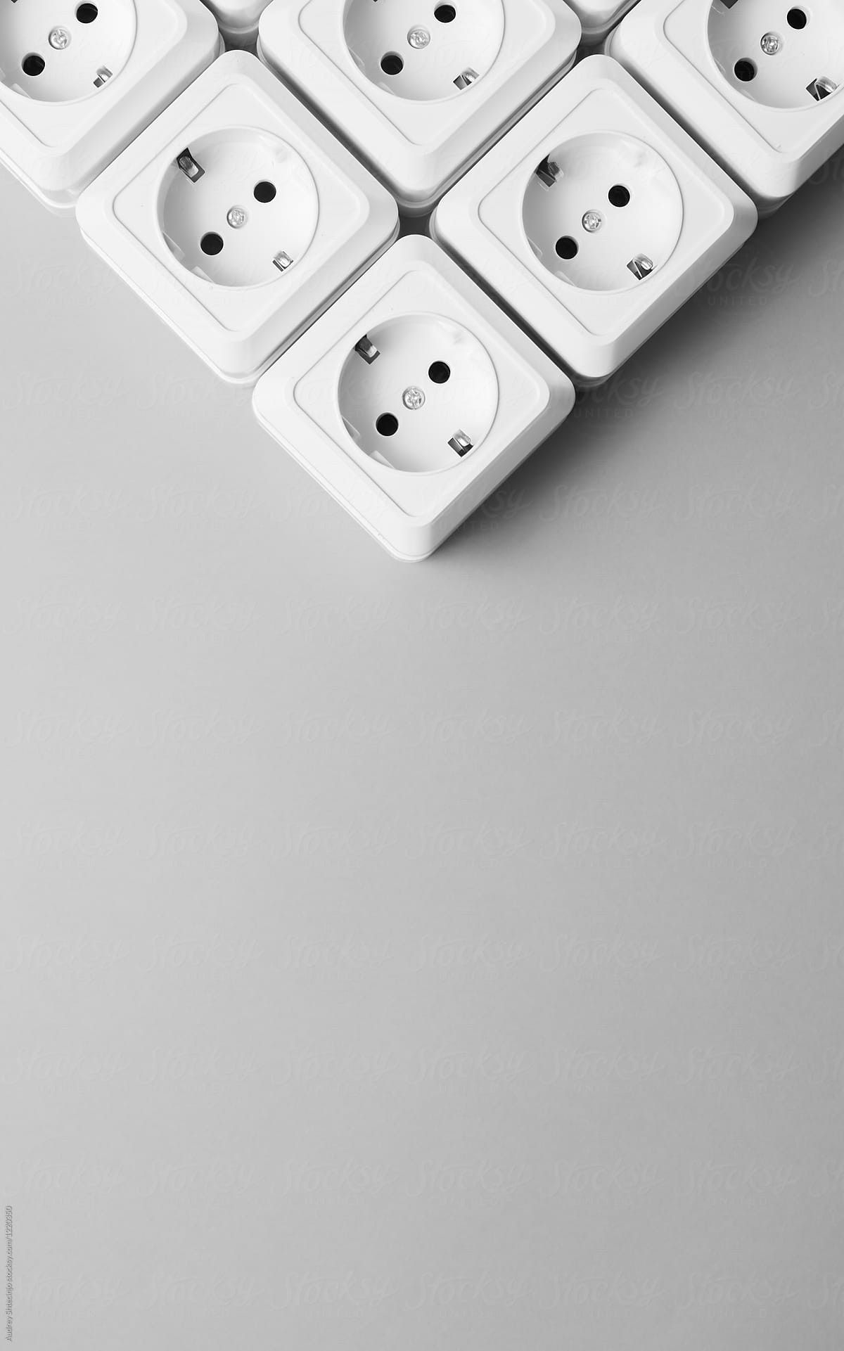 Blanc eletric plug on white/gray background.