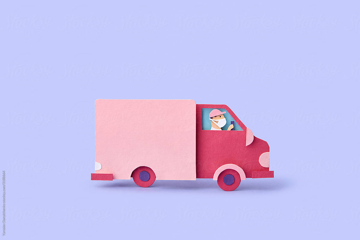 Handcraft courier in delivery truck from paper.