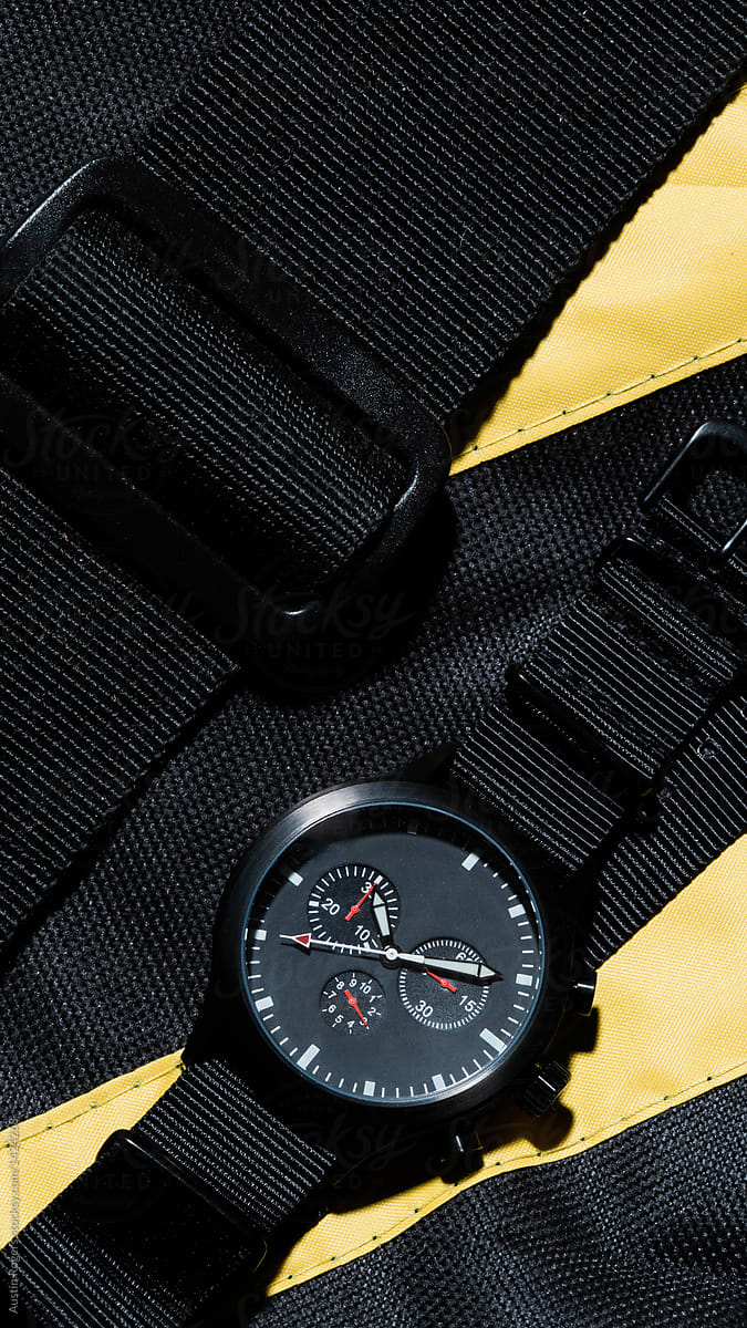 Military / police style watch on yellow and black nylon fabric