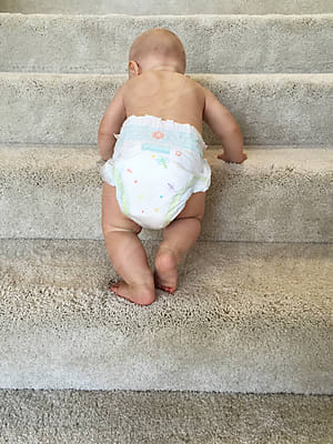 when can a baby climb stairs