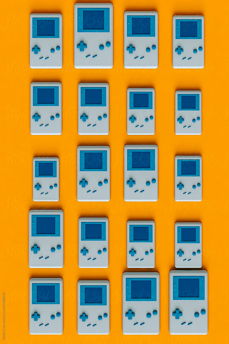 top down view of 8-bit handheld game console in different sizes