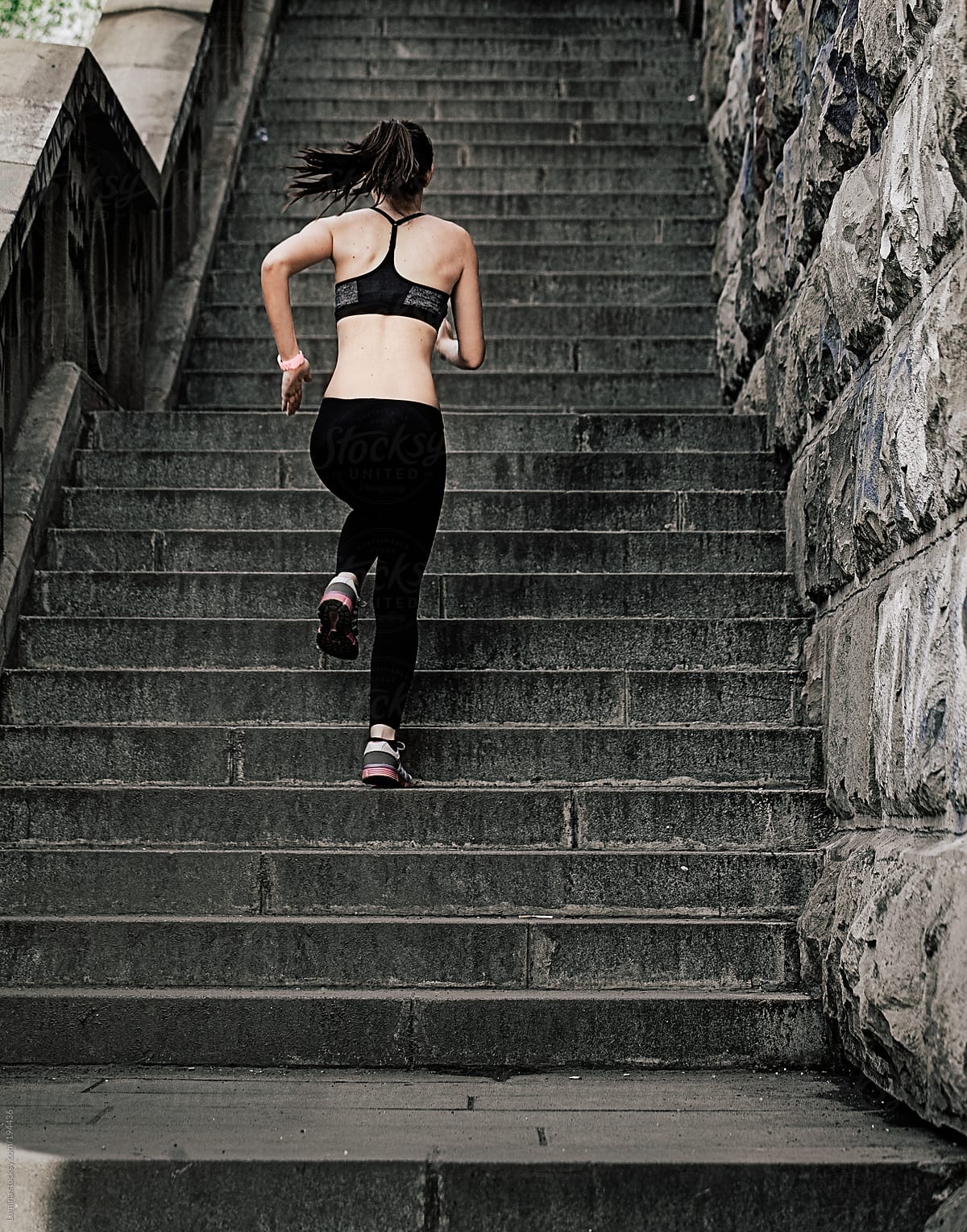 Woman Running Up the Stairs