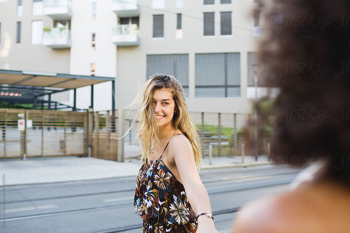 Beautiful Girl Walking Around With Her Best Friend By Stocksy Contributor Michela Ravasio 