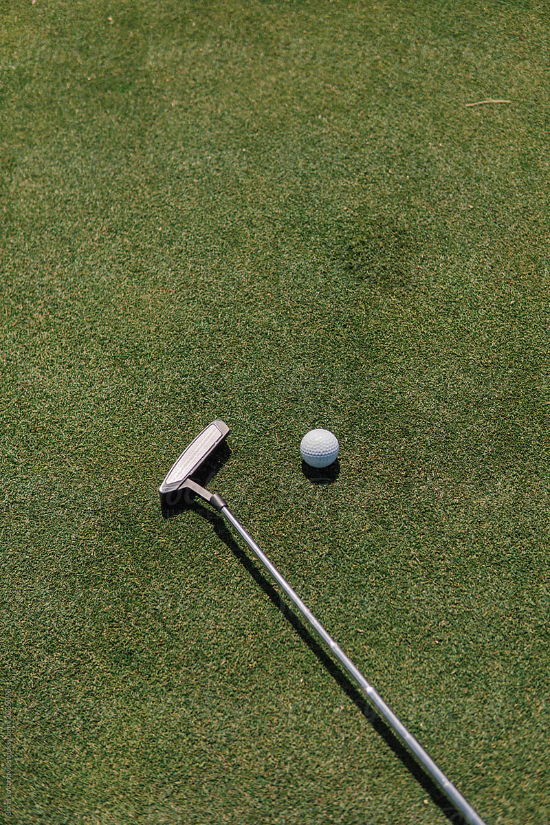 Above Shot Of A Golf Stick And Golf all On The Green Field