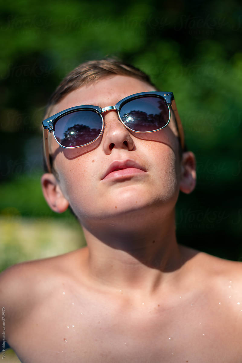 Teen Boy In Sunglasses by Stocksy Contributor Tytia Habing
