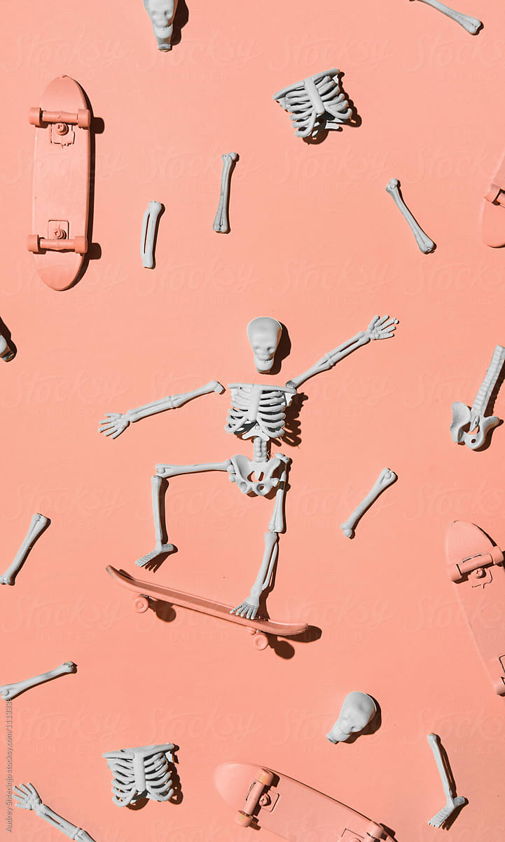 "Skate Or Die" Written With Bones With Skateboards And Bones Around It