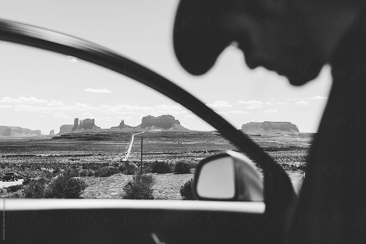 Man on the road in Monument Valley
