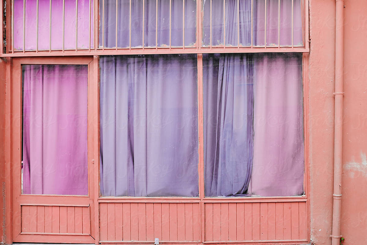Pastel Store Widows With Colorful Curtains