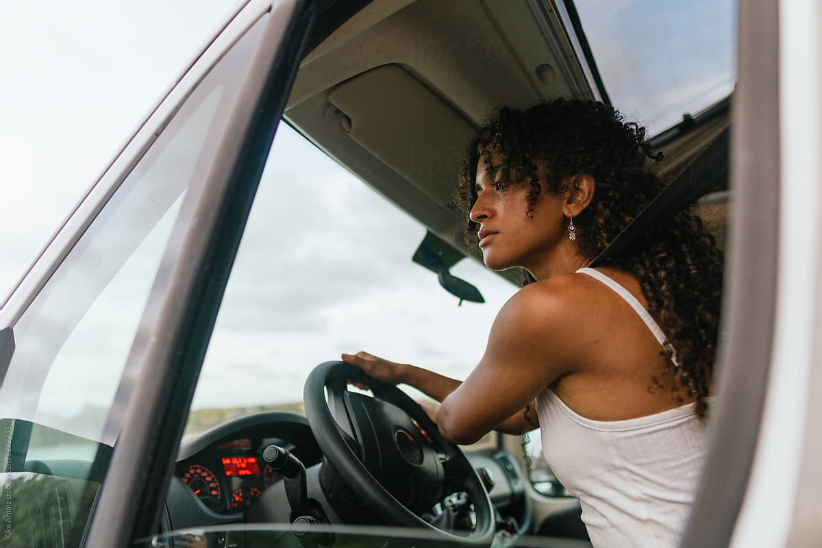 Black girl travelling alone in a van