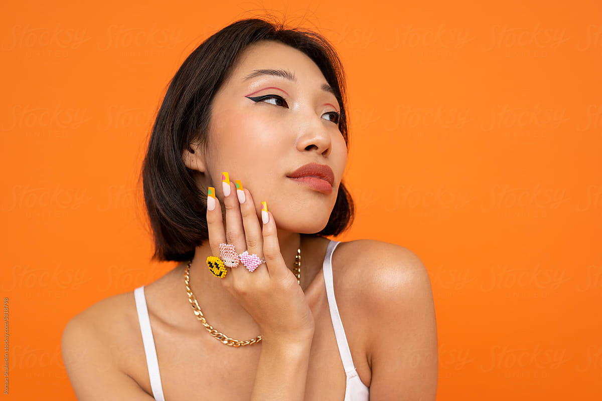 Stylish woman with trendy rings of the 2000s
