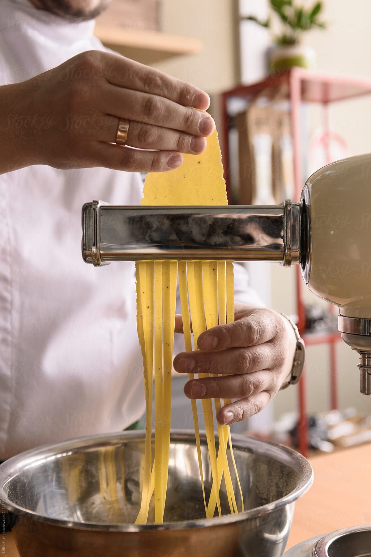 Man making pasta in restaurant