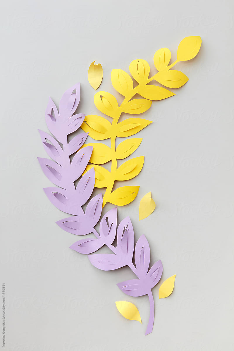 Colorful Handcraft Design Cut From Colored Paper On A Gray With by Stocksy  Contributor Yaroslav Danylchenko - Stocksy
