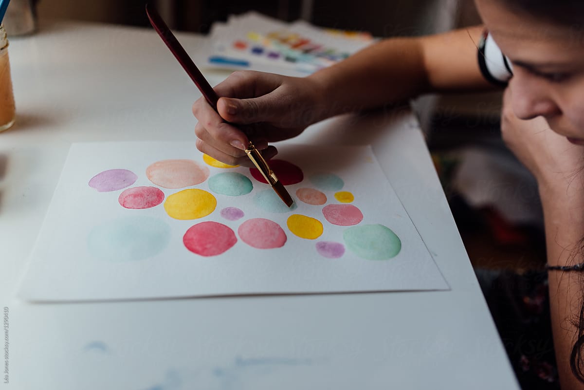 teen painting abstract circles pastel watercolours