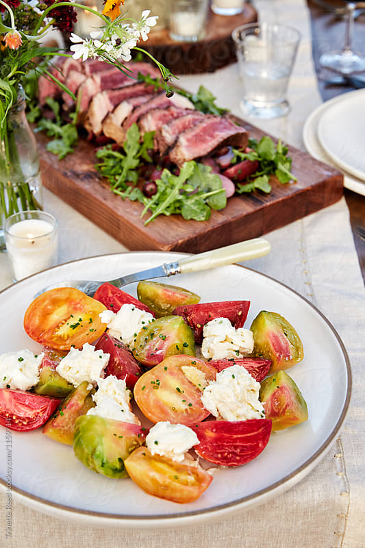 Tomato and burrata salad at a Farm To Table Dinner Party