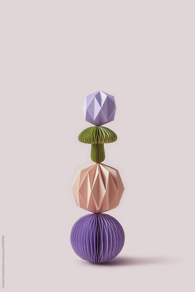 Papercraft baubles in different shapes.