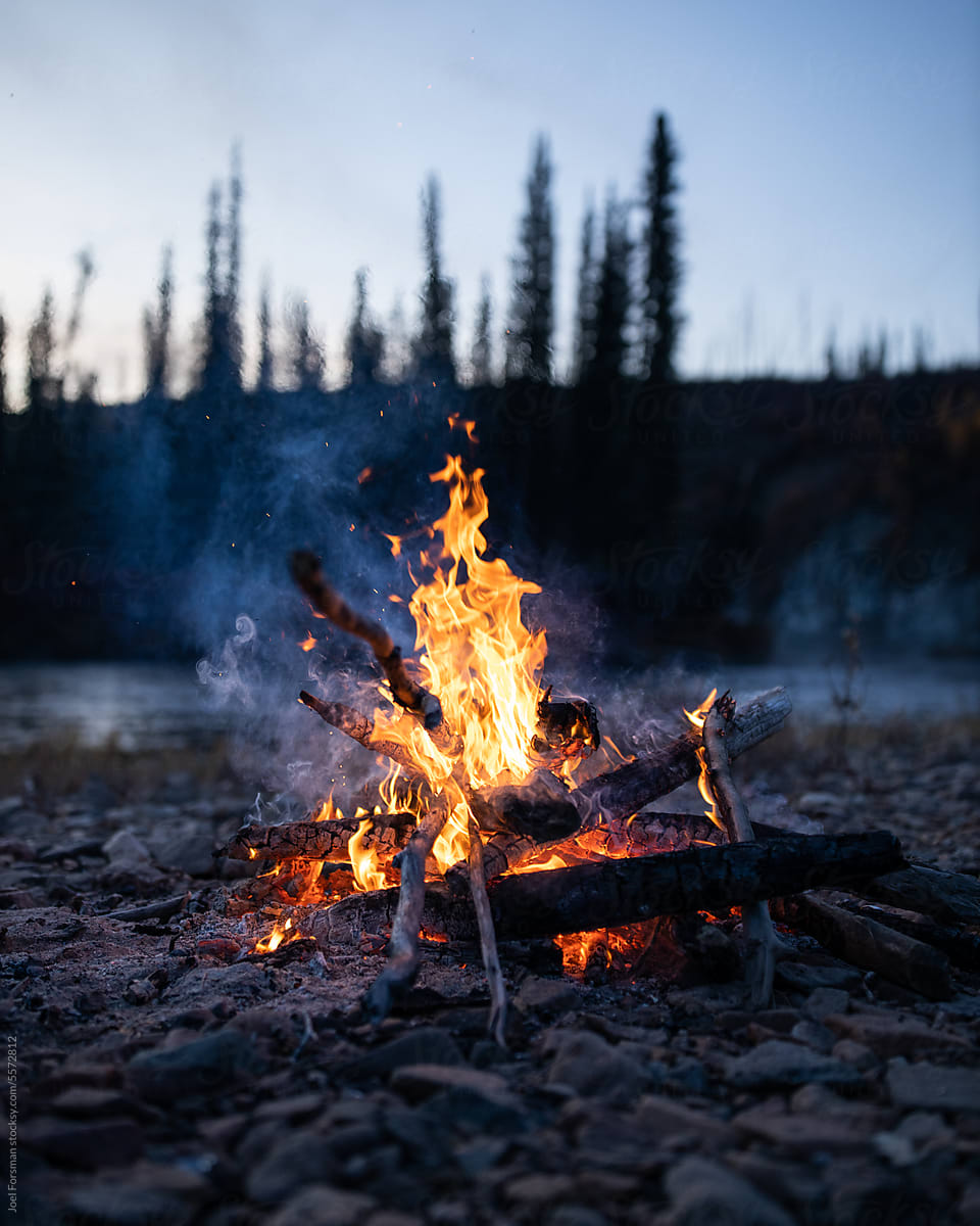 a beautiful bonfire at sunset