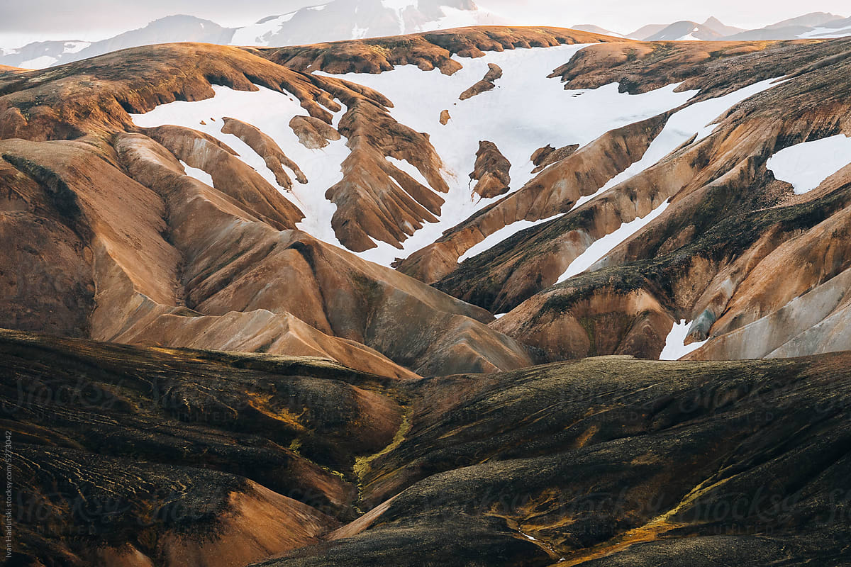 Texture And Colorful Landscape In Iceland snowy and mossy Mountains