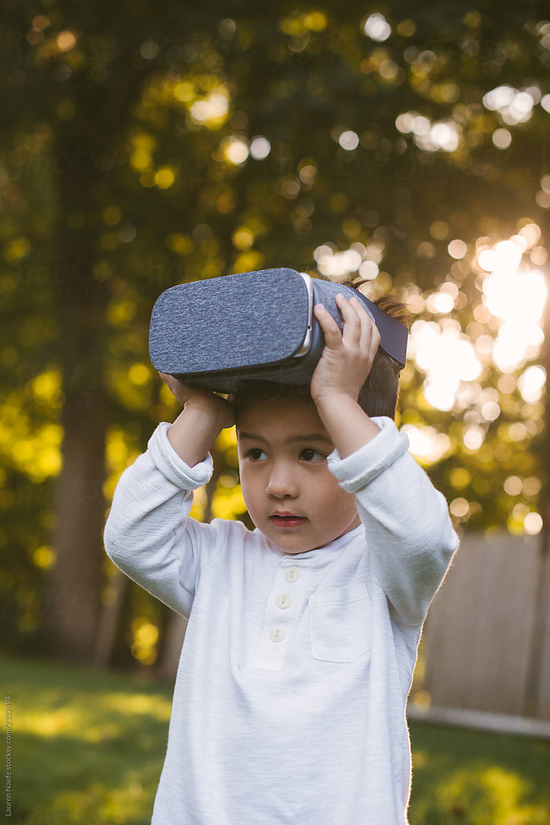 Child with virtual reality glasses
