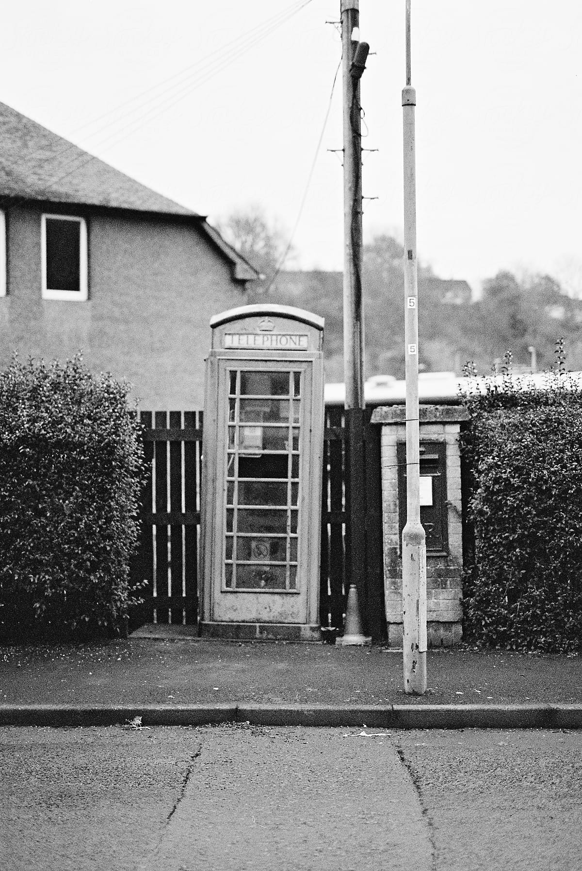 British style phone box in a residential street in the UK.