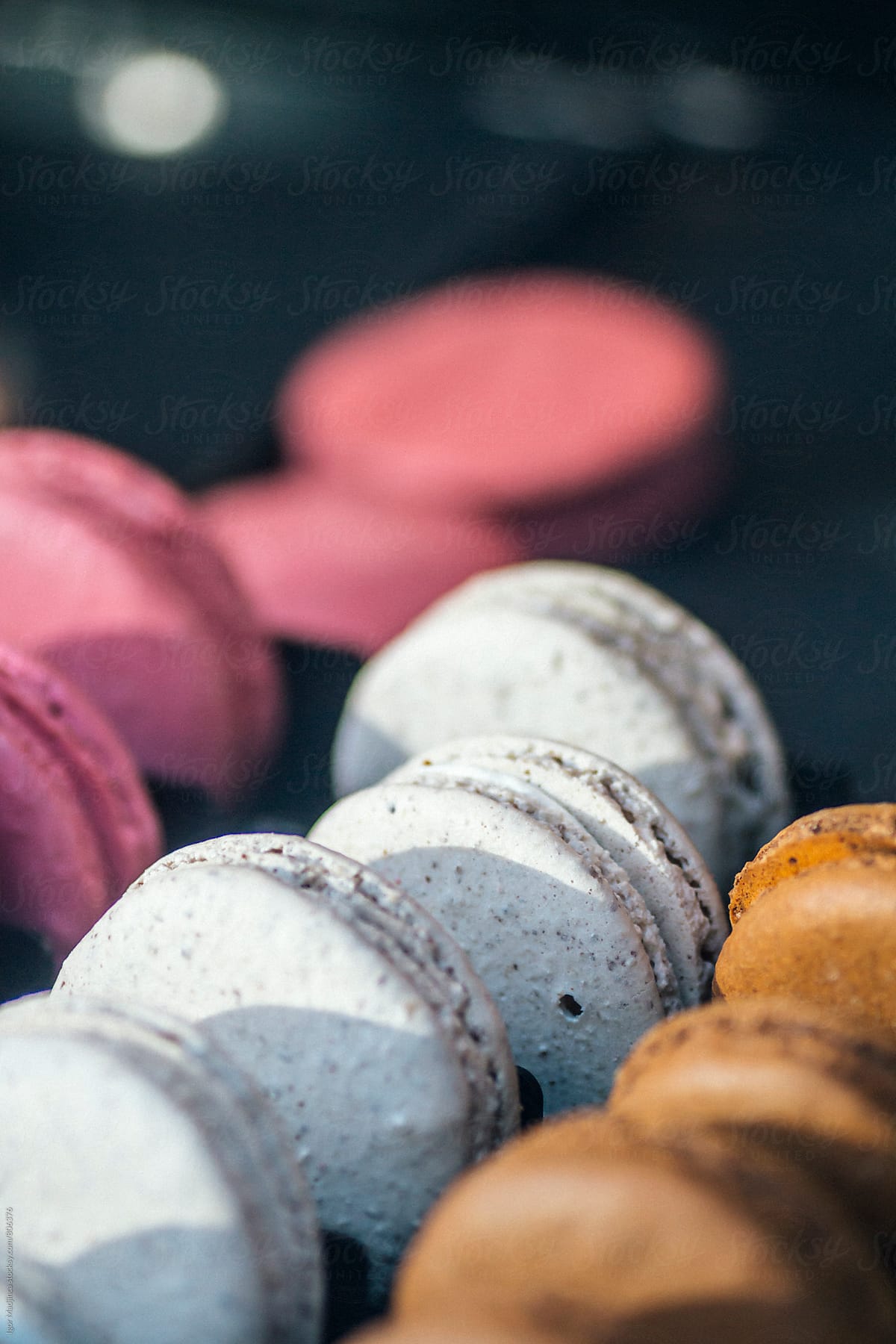 Colorful and tasty macaroons in natural light close up