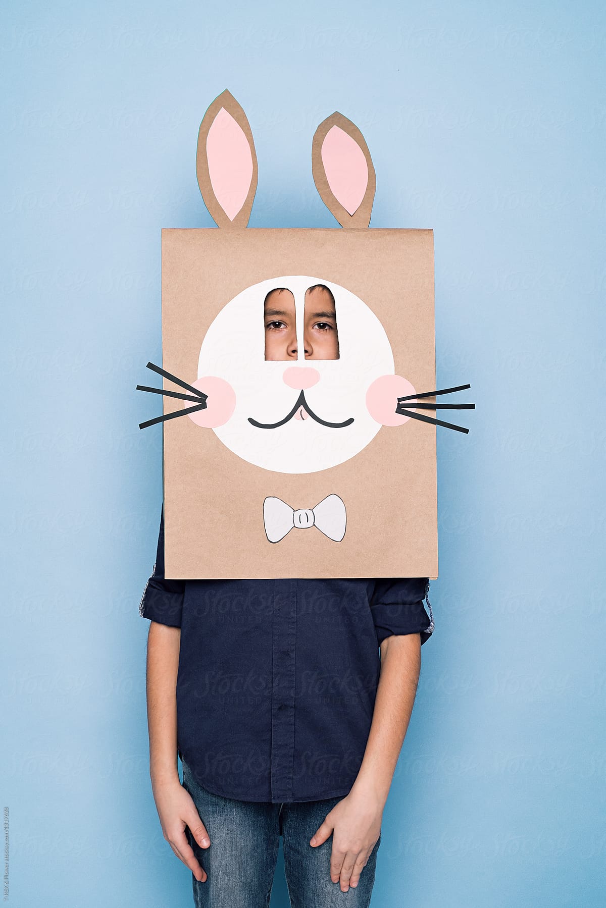 A Kid In Bunny Paper Mask" Stocksy Contributor "Danil Nevsky" -