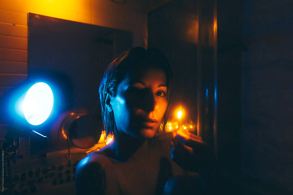 woman in a neon bathroom