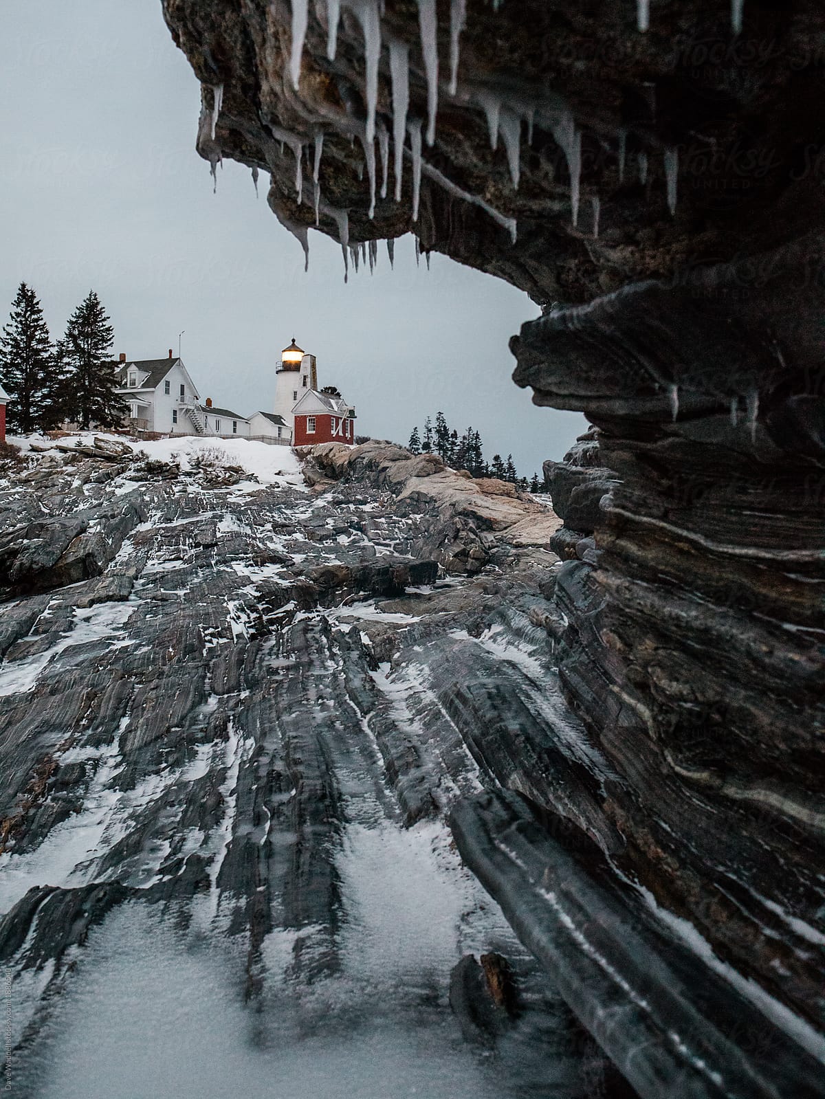 An Icy Lighthouse Scene