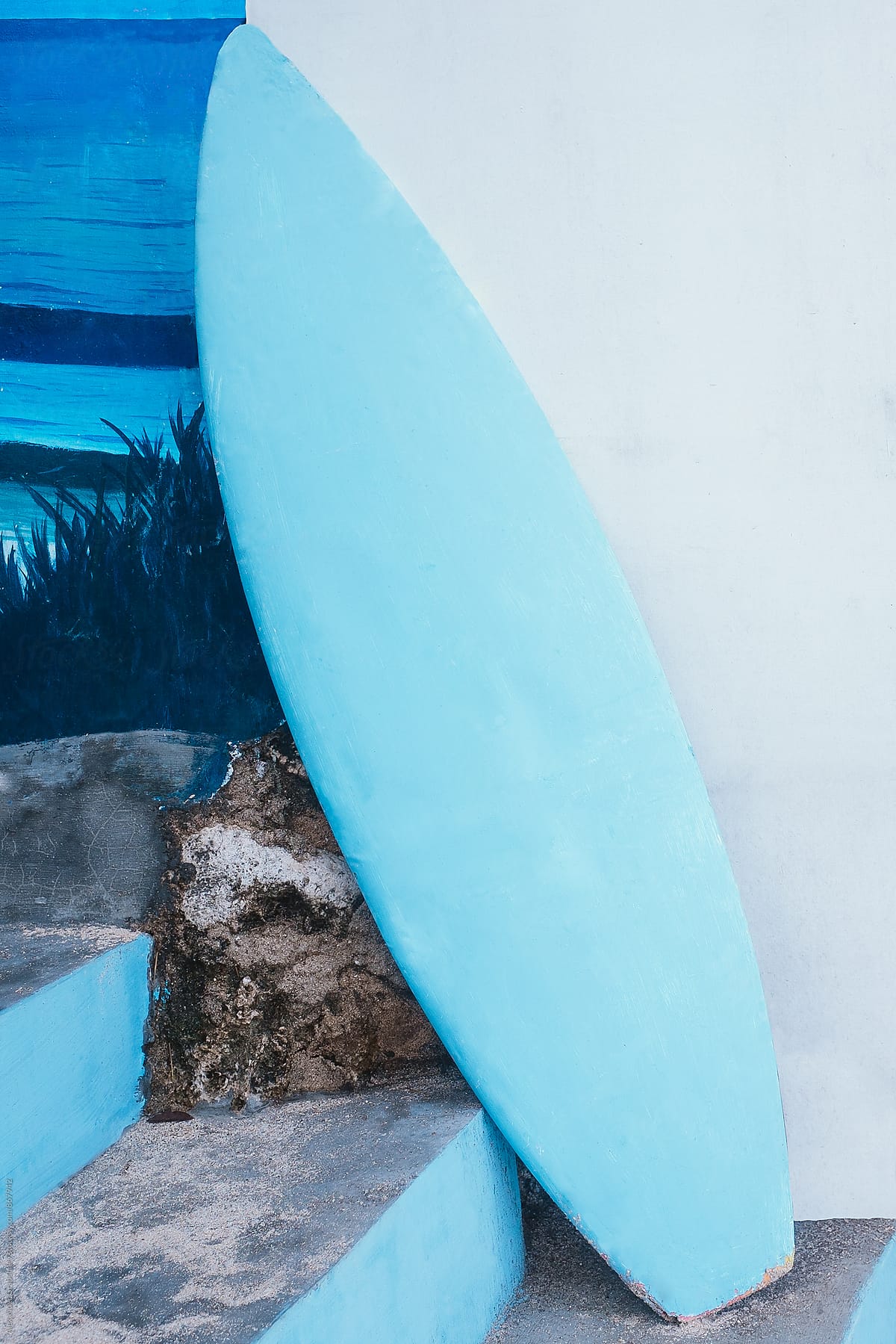 Blue Surfboard At Tropical Beach