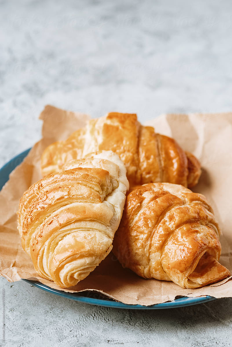 Three croissants on a plate